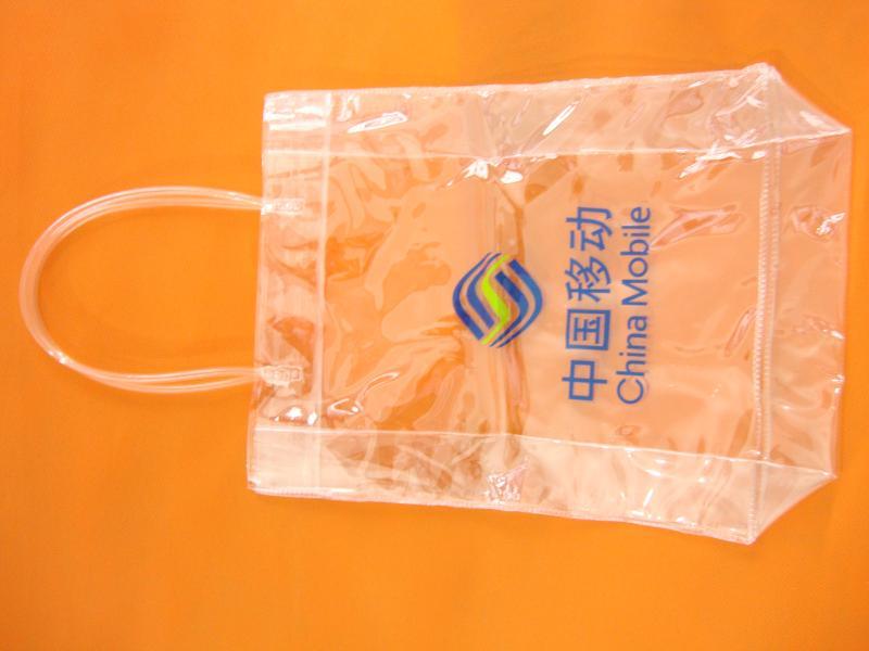 pvc环保手提包装袋pvc纽扣手提塑料袋